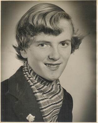 Jill Webber — studio portrait, teenage girl/young woman with short wavy hair and striped scarf, warm smile, soft sepia tone