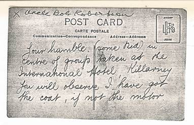 Postcard back addressed to 'Uncle Bob Robertson', written from the International Hotel, Killarney — 'Your humble, some kid, in centre of group taken at the International Hotel, Killarney. You will observe I have got the coat, if not the motor.'